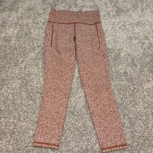 Athleta Leggings Womens‎ Small Orange Salutation Stash II Textured Tight Gym Run